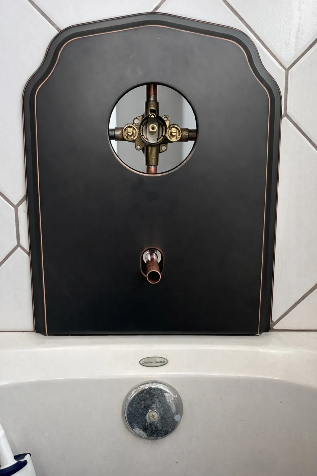 Shower valve replacement in progress with wall access